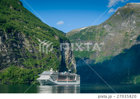 Ferry with tourists at the steep shores of Ferry with tourists at the steep shores of 27035820