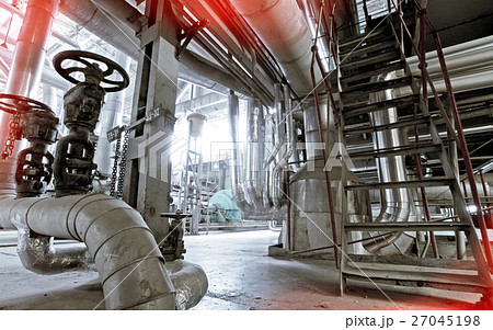 Steel pipelines and cables in blue tones 27045198