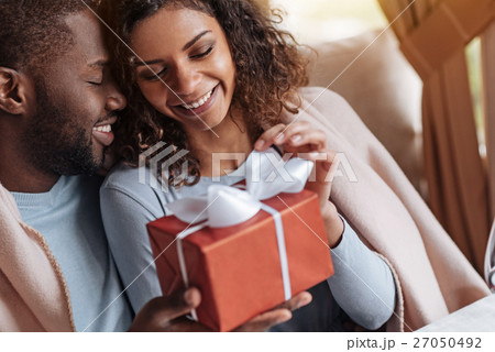 Smiling African American woman receiving Smiling African American woman receiving 27050492