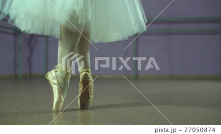 Closeup of dancing legs  ballerina wearing white 27050874