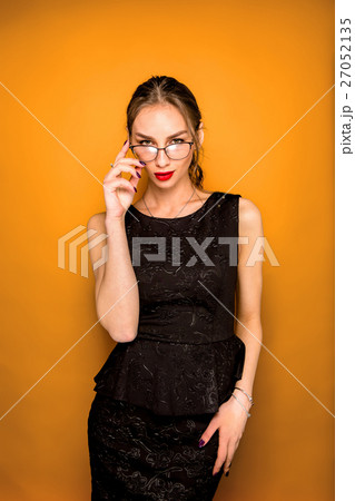 The young woman's portrait with happy emotions The young woman's portrait with happy emotions 27052135