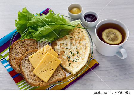 Breakfast with scrambled eggs on a transparent Breakfast with scrambled eggs on a transparent 27056007