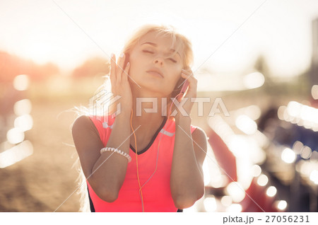 Portrait of a sporty adolescent girl resting from 27056231