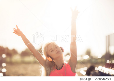 Success fitness winning woman concept with Success fitness winning woman concept with 27056254