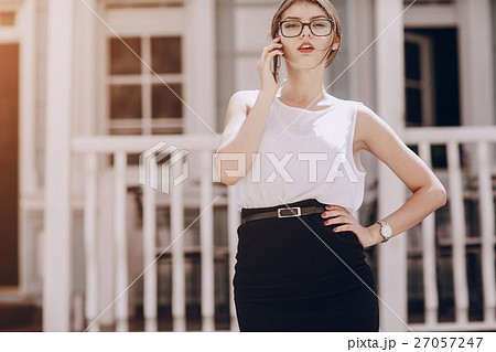 beautiful brunette with glasses 27057247