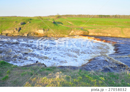 Small waterfall on river. 27058032
