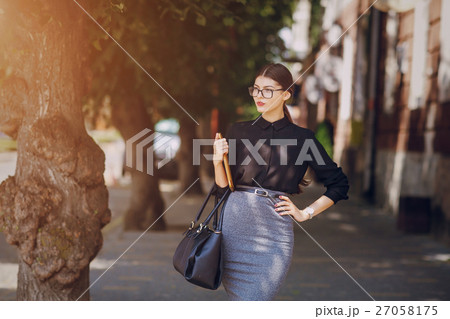 beautiful brunette with glasses beautiful brunette with glasses 27058175