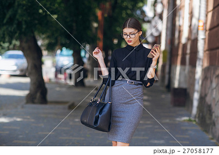 beautiful brunette with glasses beautiful brunette with glasses 27058177