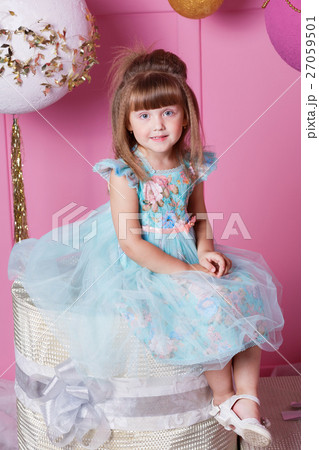 Pretty girl child 4 years old in a blue dress 27059501