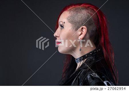 Punk woman in leather jacket, profile 27062954