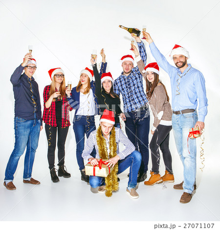 Many young women and men drinking at christmas 27071107