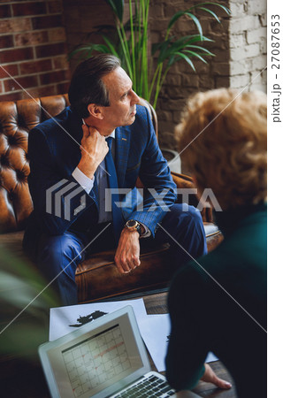 Mindful middle aged man looking at side 27087653