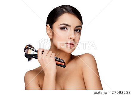 Young brunette woman with beautiful clean skin Young brunette woman with beautiful clean skin 27092258