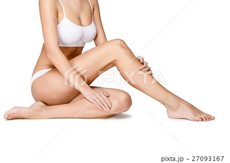 Long pretty woman legs isolated on white Long pretty woman legs isolated on white 27093167