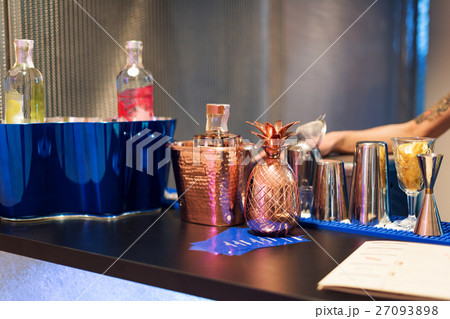 Barman show. Bartender is making cocktail at night 27093898