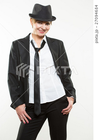 Beautiful young woman posing in business suit and Beautiful young woman posing in business suit and 27094684
