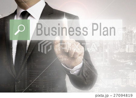 Business man with city background business plan browser 27094819