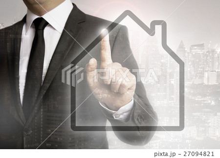 Businessman with city background house concept concept 27094821