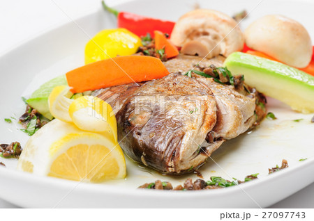 Roasted dorada fish with vegetables Roasted dorada fish with vegetables 27097743