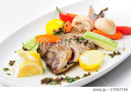 Roasted dorada fish with vegetables Roasted dorada fish with vegetables 27097746