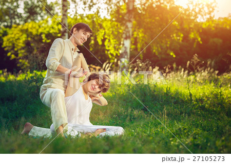 Thai massage with yoga exercises 27105273