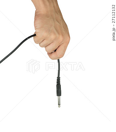 Hand with two audio cable isolated on white Hand with two audio cable isolated on white 27112132