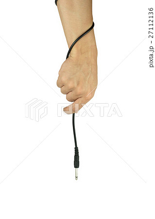 Hand with audio cable isolated on white background 27112136