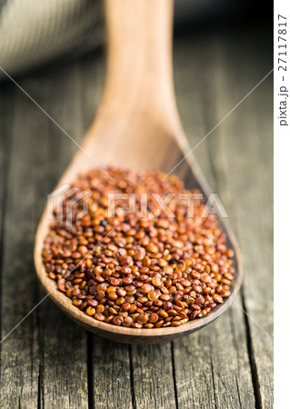 Red quinoa seeds. 27117817