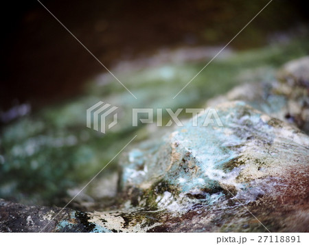 closeup on little cute narrow waterfall water surf 27118891