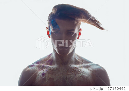 Fashion young man with creative face art and hair Fashion young man with creative face art and hair 27120442