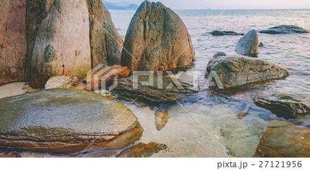 Dark night sea with protruding stones Dark night sea with protruding stones 27121956