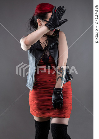 Shy punk woman in red dress Shy punk woman in red dress 27124386