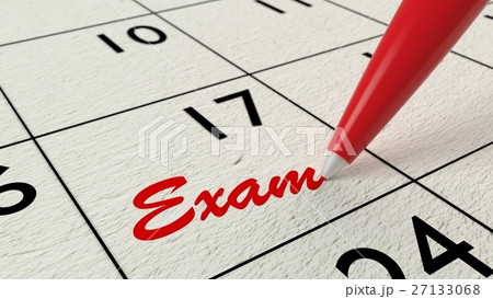 Exam reminder in calendar closeup with pen 27133068
