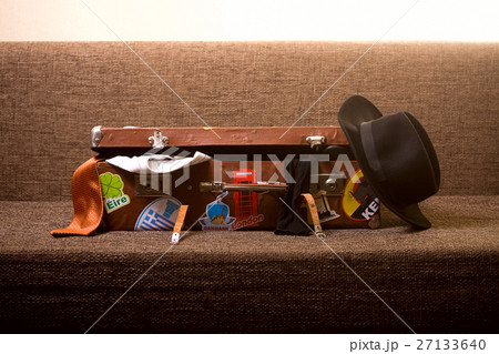men suitcase on the couch 27133640