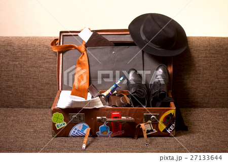 men suitcase on the couch 27133644