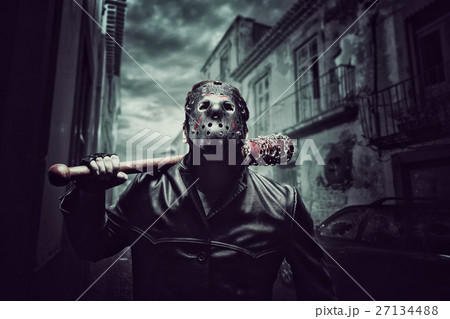 Psycho man in hockey mask with bloody baseball bat 27134488