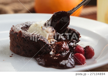 Chocolate fondant with strawberry and ice cream Chocolate fondant with strawberry and ice cream 27134894