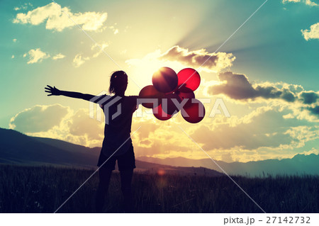 cheering youngwoman with colored balloons cheering youngwoman with colored balloons 27142732