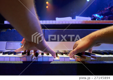 The musician at the rehearsal. 27145894