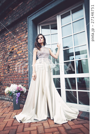 Fashion Woman Closes the Door 27146751