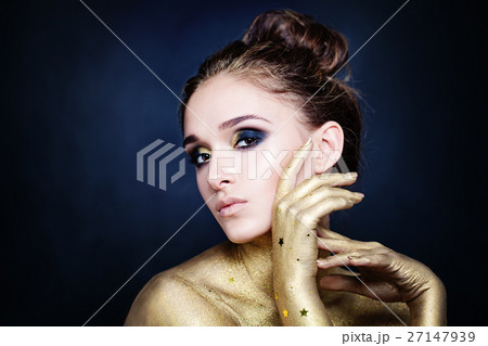 Magnificent Woman with Golden Hands on Blue Magnificent Woman with Golden Hands on Blue 27147939