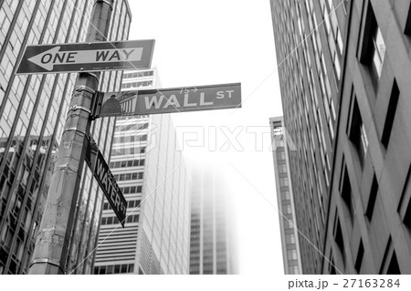 Famous Wall Street sign in the street , NYC Famous Wall Street sign in the street , NYC 27163284
