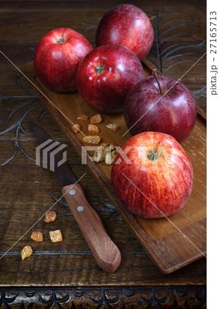 Red Gala apples on old wooden surface Red Gala apples on old wooden surface 27165713