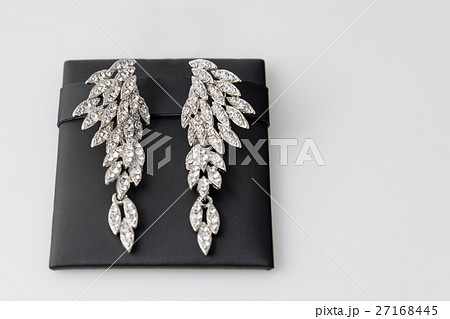 Pair of diamond or crystal silver earrings with 27168445
