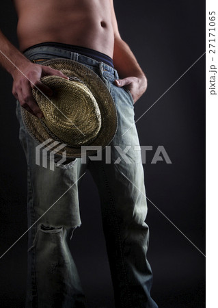 Attractive man with a straw hat Attractive man with a straw hat 27171065