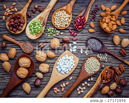 Various legumes and different kinds of nutshells  27172956