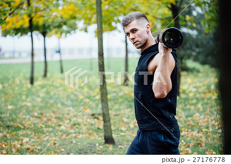 Male fitness doing exercise lunge with vipr Male fitness doing exercise lunge with vipr 27176778