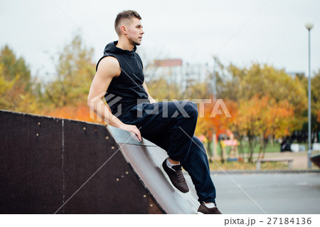 Portrait of a confident fitness guy. Man poses on Portrait of a confident fitness guy. Man poses on 27184136