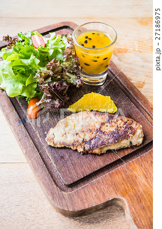 Foie gras steak with vegetable and sweet sauce Foie gras steak with vegetable and sweet sauce 27186975