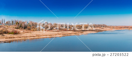 View Of Village On Overgrown Hill Near Yellowed 27203522